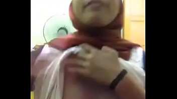 Muslim girl exposes her tiny tits and pussy